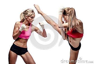 Two attractive athletic girls fighting Stock Photo