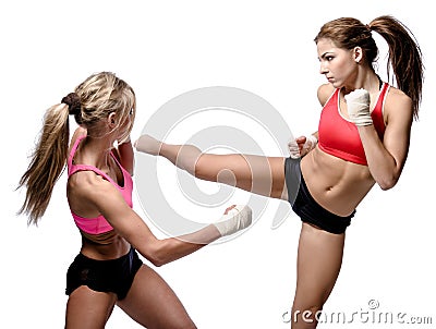 Two attractive athletic girls fighting Stock Photo