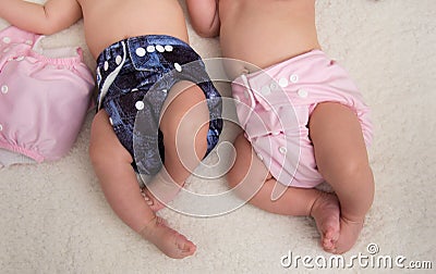 Babies with eco cloth diapers Stock Photo