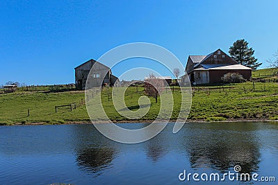 Two barns on the hill Stock Photo