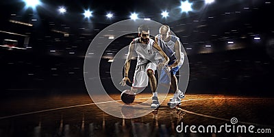 Two basketball players in action Stock Photo