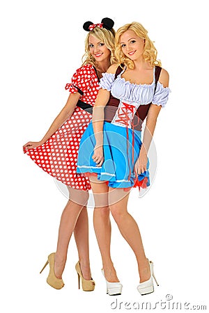 Two beautiful blonde women in carnival costumes Stock Photo