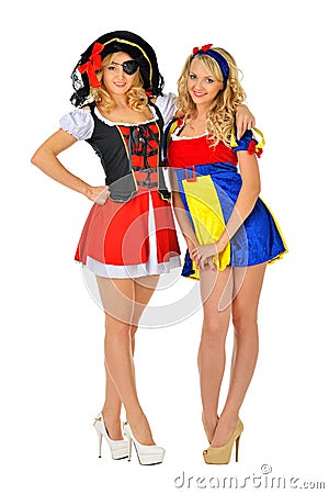 Two beautiful blonde women in carnival costumes Stock Photo