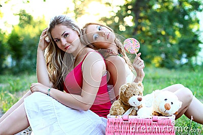 Two beautiful caucasian women with candy Stock Photo