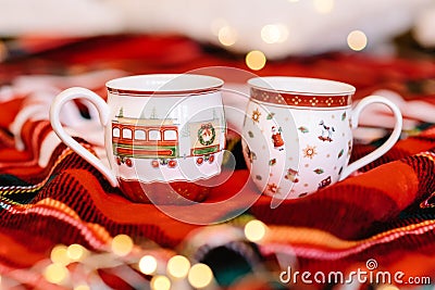 Two beautiful cups with Christmas decor. Festive atmosphere and hot cocoa cups. Christmas still life Stock Photo