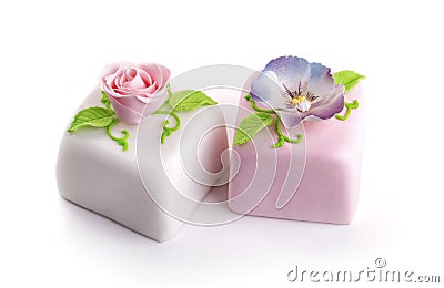 Two beautiful decorated marzipan cakes on white Stock Photo