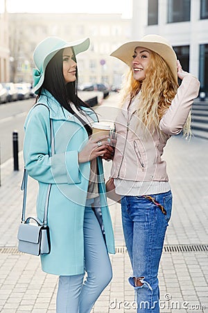 Two beautiful girls in hats Stock Photo