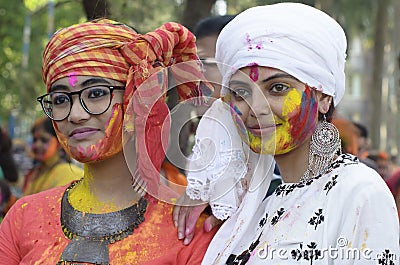 Two beautiful girls smeared with holi colours Editorial Stock Photo