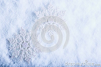 Two beautiful sparkling vintage snowflakes on a white frost snow background. Winter and Christmas concept Stock Photo