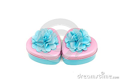 Two beautifully decorated heart shape containers in pastel color Stock Photo