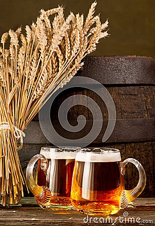 Two beer glasses with bundle of wheat Stock Photo