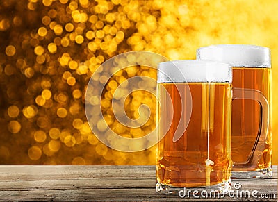 Two beer glasses on table Stock Photo