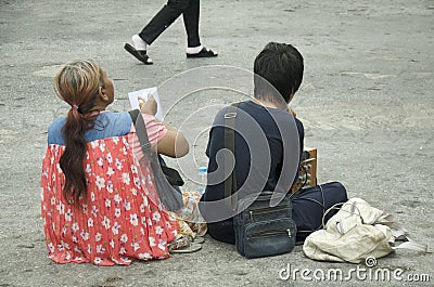 Two beggar begging money from thai people and traveller Editorial Stock Photo