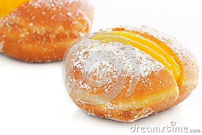 Two Berliner with egg creme over white Stock Photo