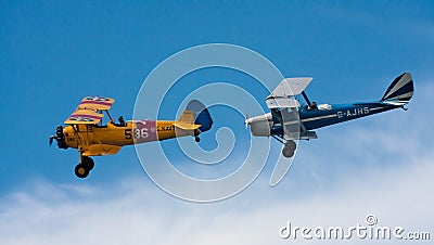 Two biplanes in a simulated dog fight Editorial Stock Photo