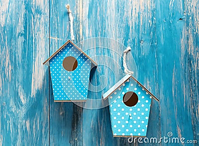 Two birdhouses on antique rustic wood Stock Photo