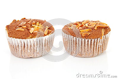 Two biscuit cupcakes with nuts Stock Photo