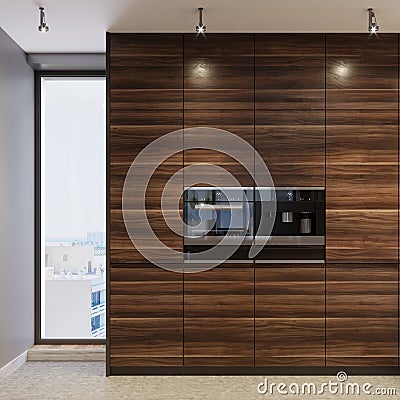 Two black, built-in ovens in wooden kitchen furniture Stock Photo