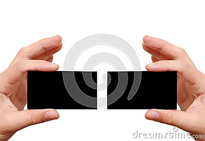 Two black business cards in hands Stock Photo