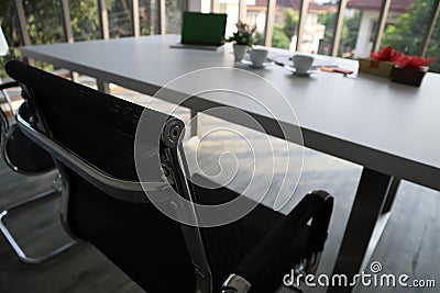 Two black chairs and white table and other stuffs Stock Photo