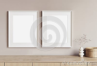 Two blank picture frames mockup on a wall. Templates for painting or poster. White living room interior design. Stock Photo