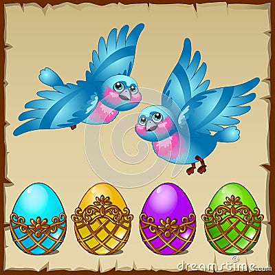 Two blue birds with colored eggs in a golden stand Stock Photo