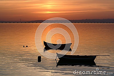 Two boats at sunset Stock Photo