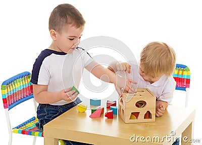 Two boys enthusiastically paint markers Stock Photo