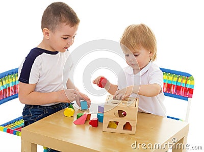 Two boys enthusiastically paint markers Stock Photo