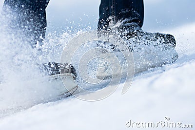 Two breaking ice skates with flying Stock Photo