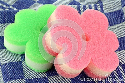 Two brightly colored abrasive pads Stock Photo