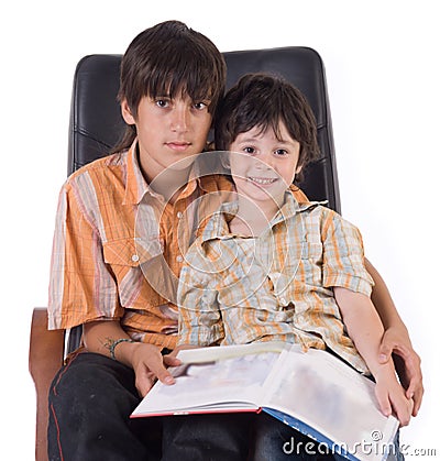 Two brothers with book Stock Photo