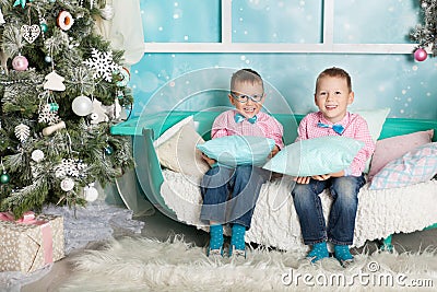 Two brothers in a Christmas decorations Stock Photo