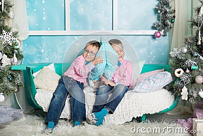 Two brothers in a Christmas decorations Stock Photo