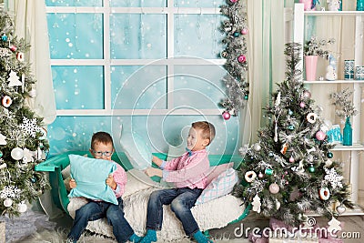 Two brothers in a Christmas decorations Stock Photo