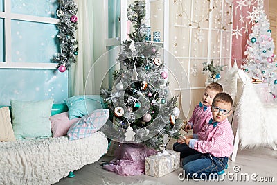 Two brothers in a Christmas decorations Stock Photo