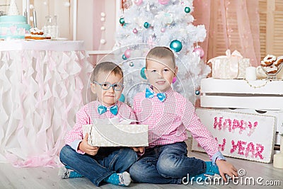 Two brothers in a Christmas decorations Stock Photo