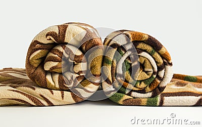 Two,brown color,soft polar fleece blanket,rolled,isolated on the white Stock Photo