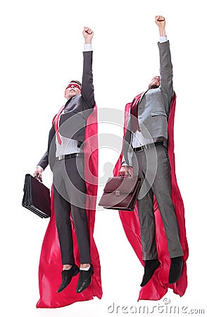 Two business leaders in superhero capes starting out together Stock Photo