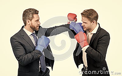 two business men in boxing gloves punching for leadership isolated on white, business fight Stock Photo