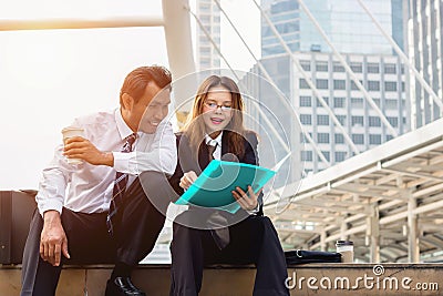 Two business person are happy to work Stock Photo