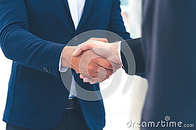Two businessman shake hand for the first meeting. Two business people greeting outdoor Stock Photo
