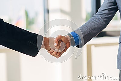 Two businessman shake hands Stock Photo