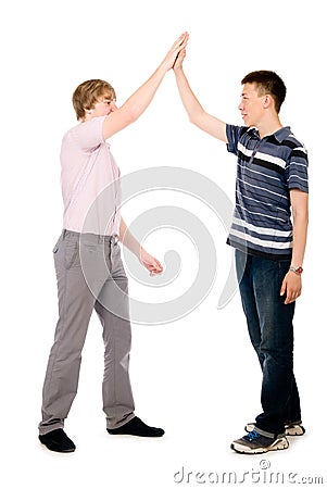 Two businessmen give each other a high five Stock Photo