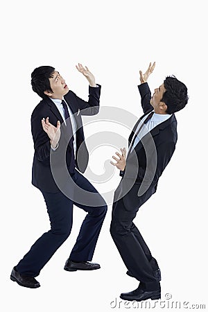 Two businessmen looking very shocked Stock Photo