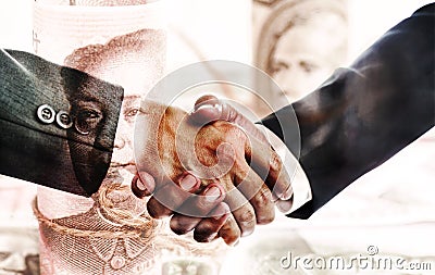 Two businessmen shaking hands after successful negotiations. The concept of trade and financial relations Stock Photo