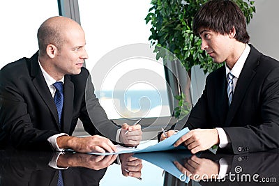 Two businesspeople negotiating Stock Photo