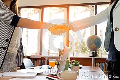 Two Businesswoman Having Handshake Stock Photo