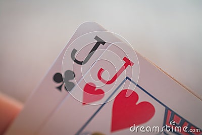 Two cards two jacks, Playing cards in hand on the table, poker nands Stock Photo