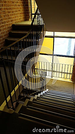 Two carpeted passageways as part of the stairs in a modern residential building. Stock Photo